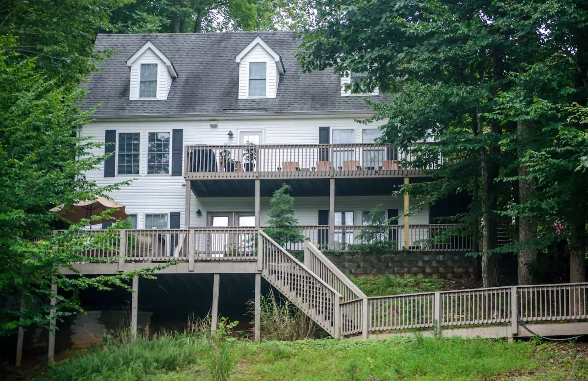 Water-facing side of the house with multi-tier decks